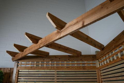 A close up of a finished pergola