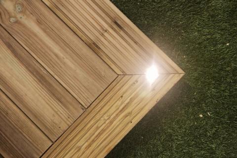 a wooden garden deck with fitted led lighting